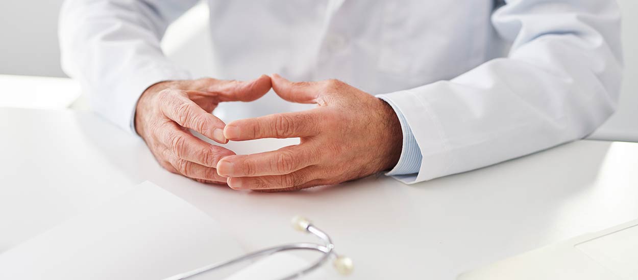 doctor-sitting-at-a-desk