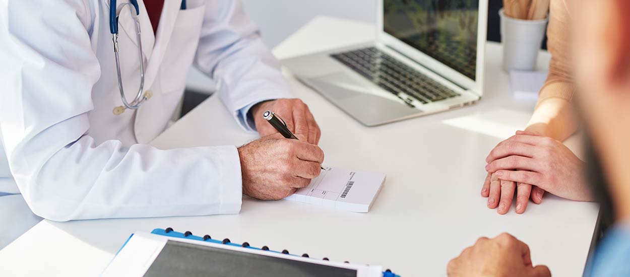 doctor-writing-a-prescription-for-his-patients