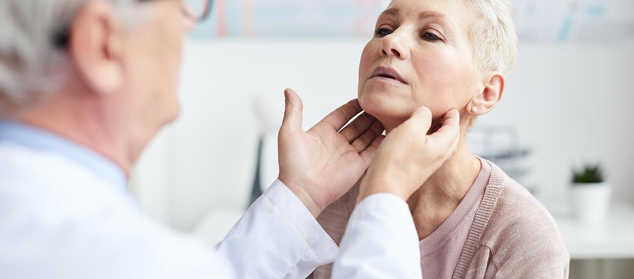 doctor-checking-size-of-lymph